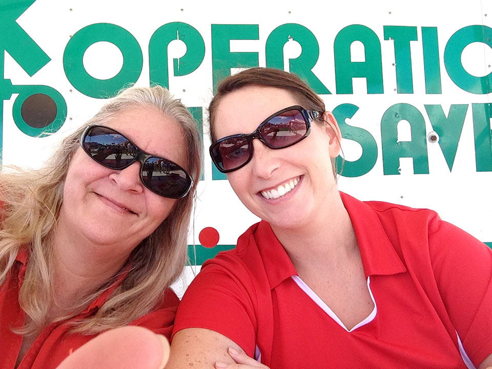 Kathy_Kugler_and_Shannon_Torrini_NL_Journalists_Volunteer_with_Operation_Lifesaver_at_NE_State_Fair2_