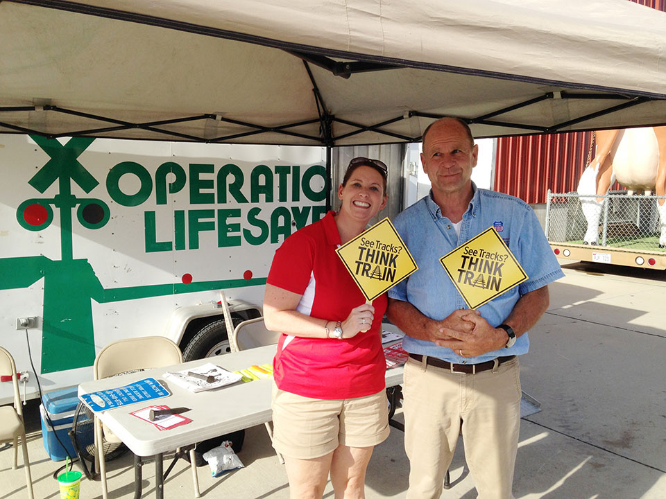 Shannon_Torrini_NL_Journalist_and_Pat_Leahy_NP_Trackman_With_Operation_Lifesaver_at_NE_State_Fair2_